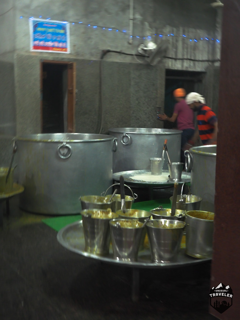 the people working in the kitchen at the golden temple