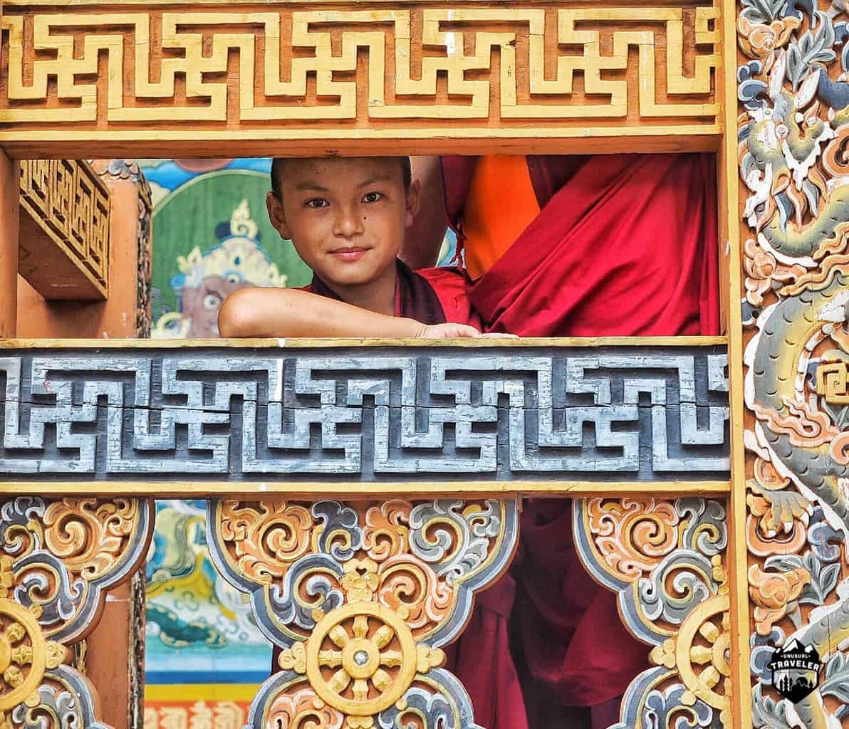A young monk inside Punakha Dzong, the locals are always smiling.