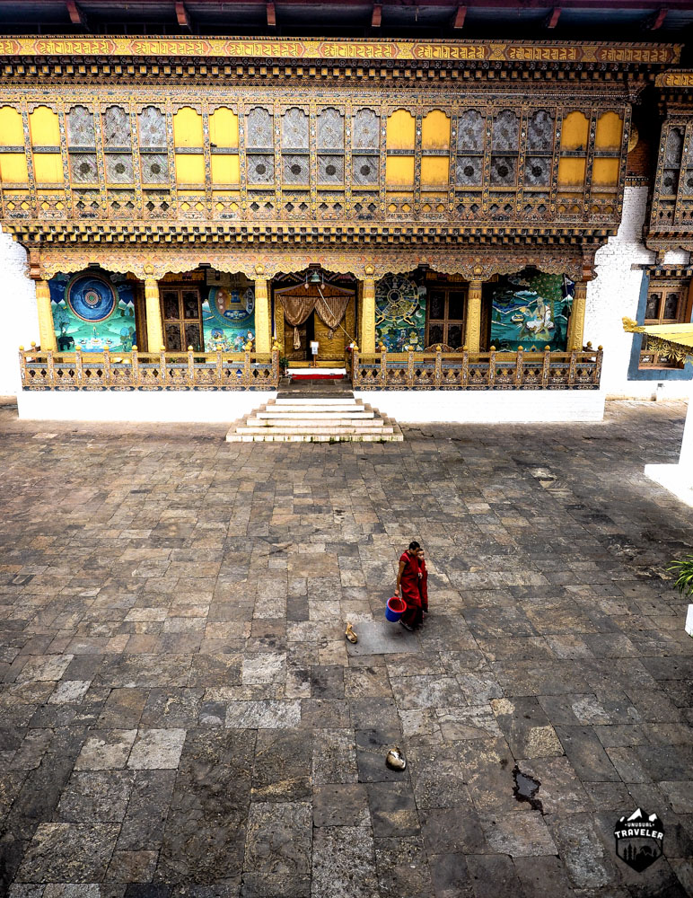 Two Monks walks across the third courtyard, the temple with the national treasures are located on the right side of the courtyard.