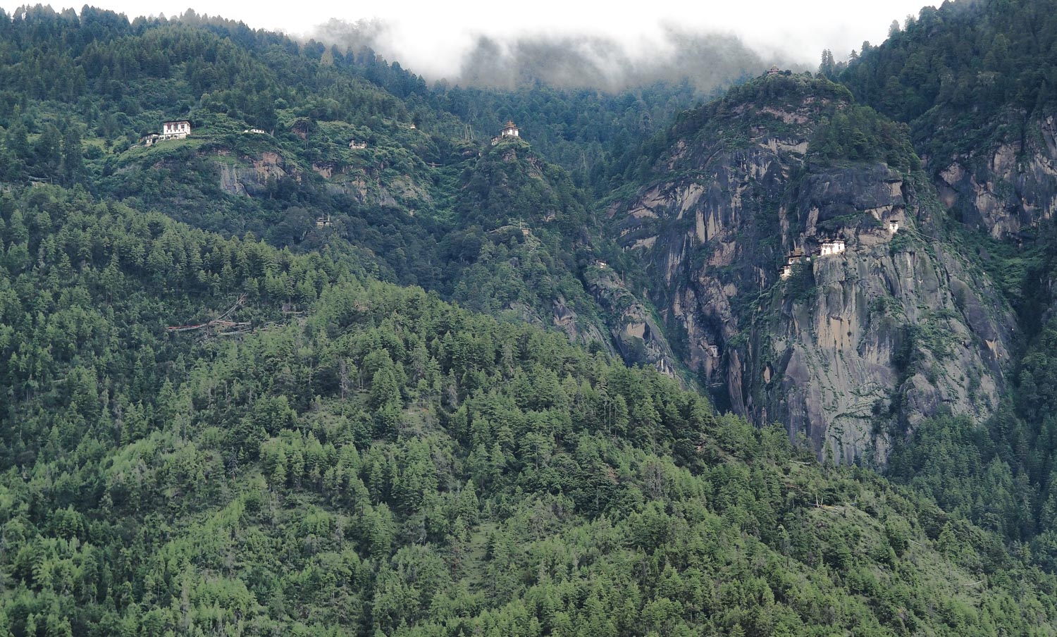 The Tiger Nest up there to the right as seen from the road in Bhutan