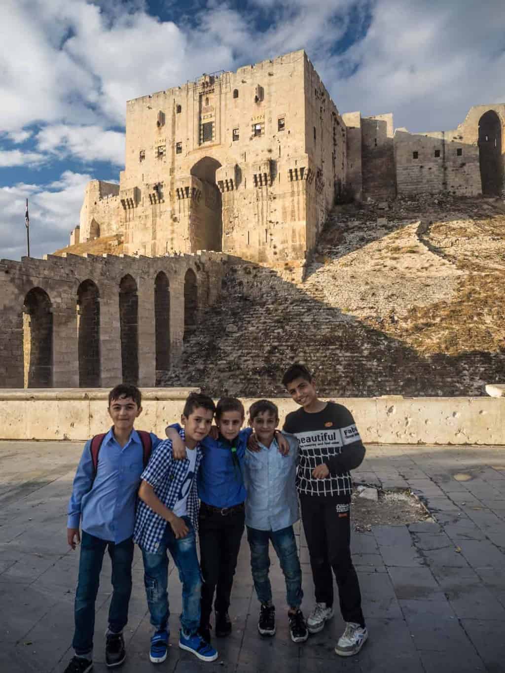 young Syrian kids in front of Aleppo Citadel 2017
