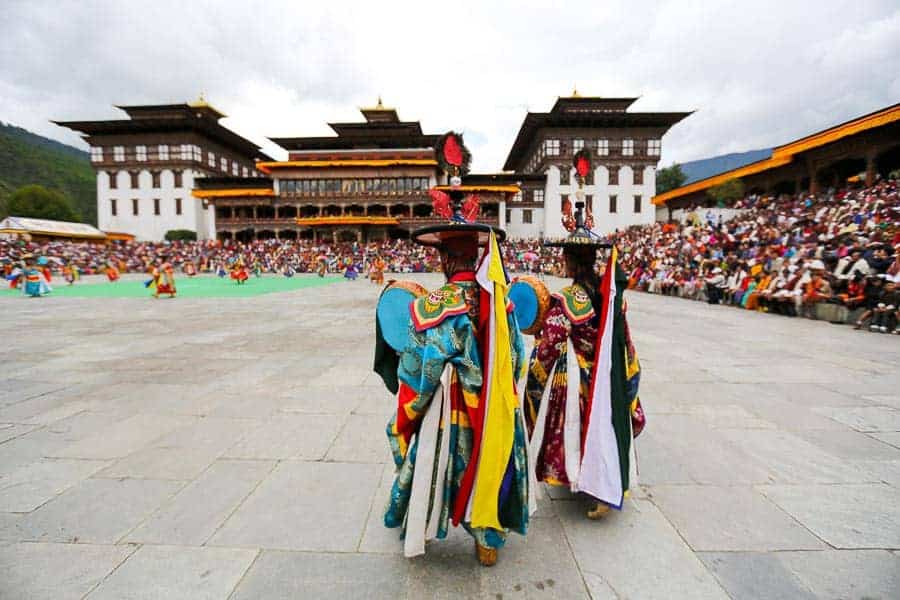 Local danscers at Thimphu Tshechu. Top 10 Things to do in Bhutan.10 Things To Do In Bhutan.