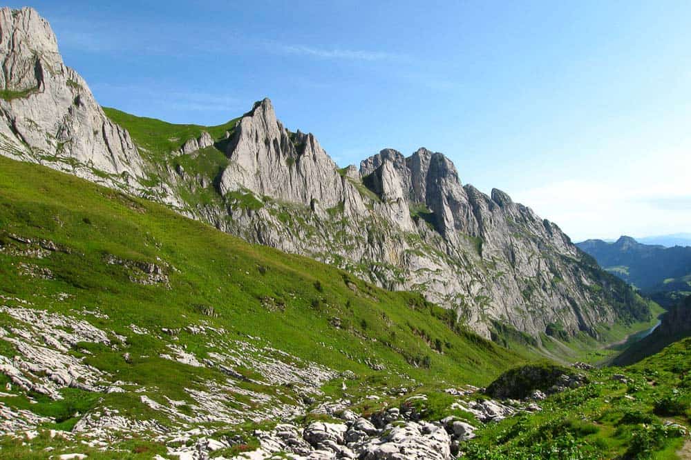 Hiking up to the Zwinglipass on limestone rocks in Switzerland