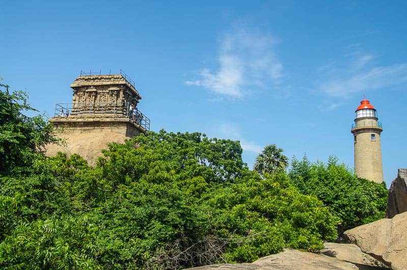 The top of the cave temple with Mahabalipuram lighthouse to the right. south india