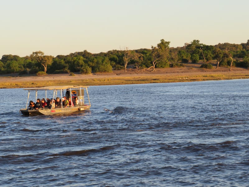 you can also go on safari down the river with a boat Botswana