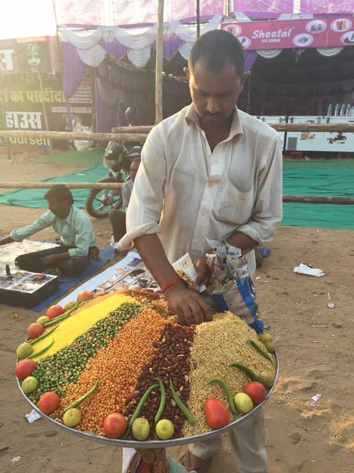 Man selling bhel puri an Indian snack
