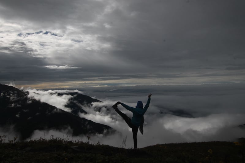 doing yoga on Mardi Himal trek in Nepal